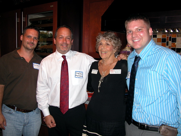 Randy Risorto of Costco in Boca Raton, left, with Gregg Weiss of Raymond James, Eileen Bushman and James Stewart of All Florida Paper. 