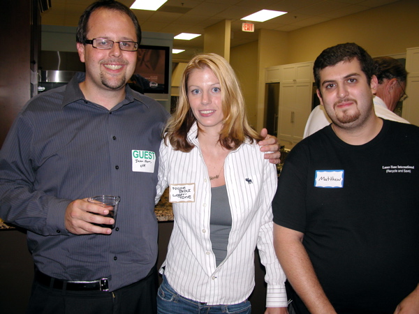 Jason Brown, a CPA with Steiner and Gelber PA, left, with Nicole Brock and Matthew, both of Laser-Tone International. 