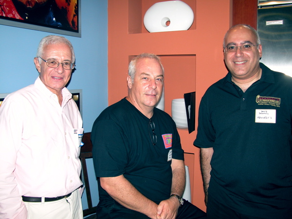 Steve Gorban of Office Furniture Warehouse in Pompano Beach, left, with Garry J. Marsh of Local Loop and David Solomon of Kennedy's All American Barber Club.