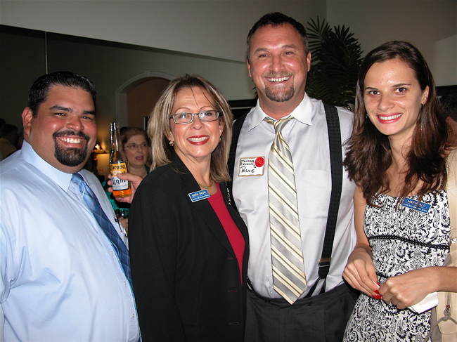 Luis Correa, left, with Maria A. Gaitan, Jeffrey "Blue" Caniff and Maria Alii. Correa, Gaitan and Alli are all with Consumer Credit Management Services of Delray Beach. Caniff is with Right Track Financial Services in Delray Beach. 