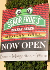 open for business sign at senor frogs