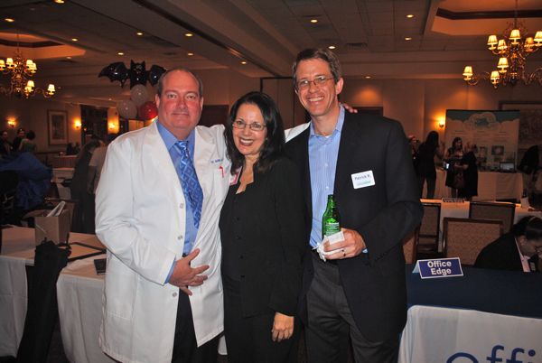 Gary L. Burns of the Sanctuary Chiropractic & Acupuncture Center, Leoni Kendall of Boomer Times and Senior Life and Patrick Ramsden of Office Edge. 