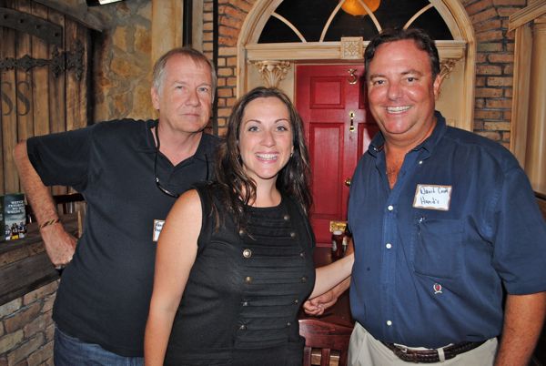 Randy Grinter of Pineapple Groove, a new club going into the site of the old City Limits, with Christie Artura-Klammer of Sustainable Marketing of St. Cloud and David Cook of Hand's Office Supply and Furniture. 