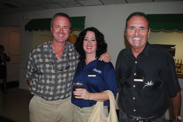 Mike and Terri Ging of Pinch A Penny Pool Patio Spa, with Ross Freeman. 