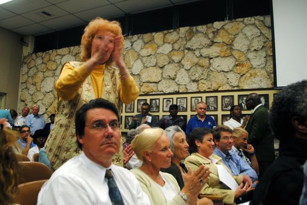 Mary Kilpatrick applauds a speaker opposed to Delray's proposed fire service fee. 