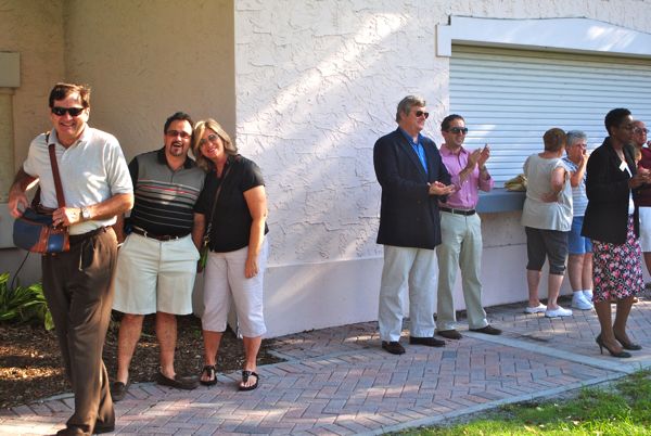 Faces in the crowd: From right: Mike Malone, president of the Delray Beach Chamber of Commerce, Charles and Cindy Maurer, Delray city commissioners Tom Carney, Adam Frankel and Angeleta Gray. Commissioner Al Jacquet also joined the party before attending a city commission budget meeting. 