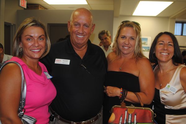 Marin Rowland of Smart Property Moves of Deerfield Beach, with Ron Gilinsky of Pearce Windows and Doors, Christine Klespies of Beyond the Cage — the Fine Art of MMA in Boca Raton and Alex Kienle of Nestler Poletto Sotherby's International Real Estate. 