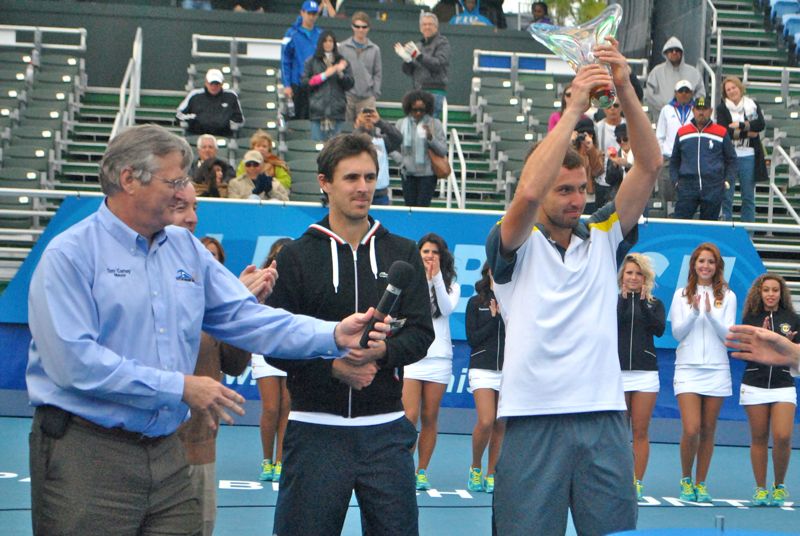 Delray Beach Mayor Tom Carney with Edouard Roger-Vasselin and Ernests Gulbis during the trophy presentation Sunday. 
